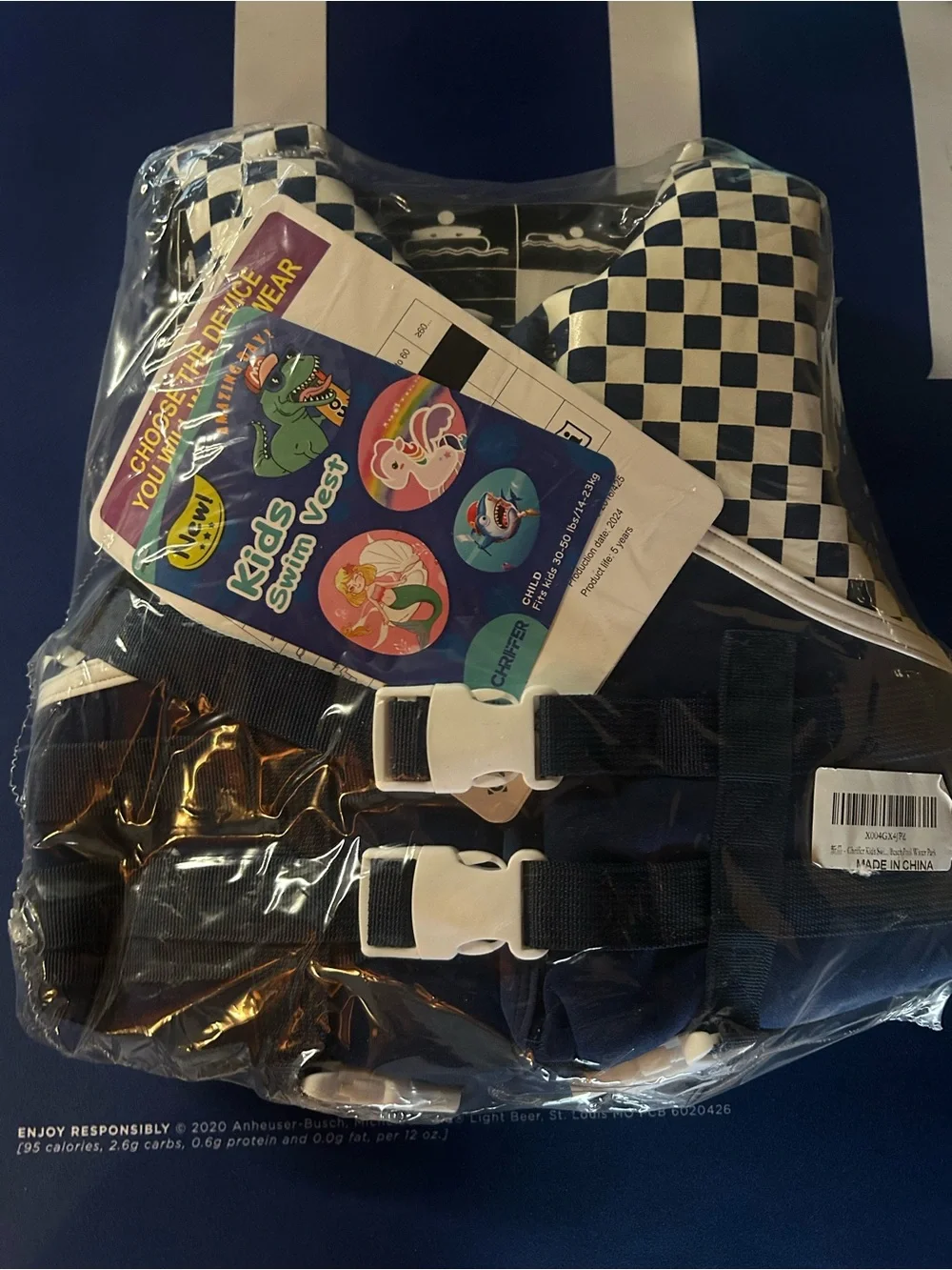 On Running Blue and White Checkered Kids Life Jacket